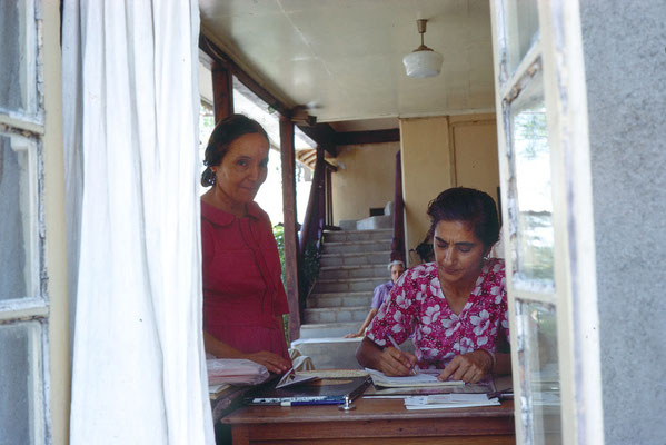 Mehera dictating a letter to Meheru with Rano in the background. Photo taken by Clive Adams-1971-3.