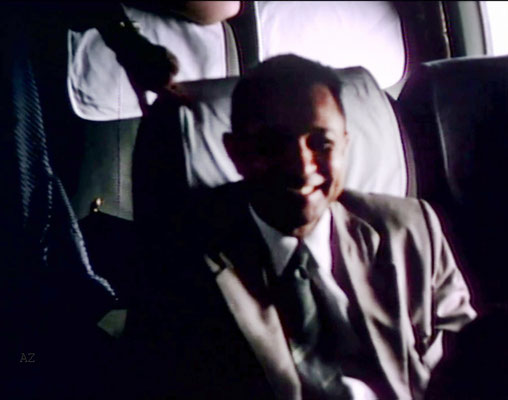 Meherjee Karkaria sitting opposite Meher Baba flying from Newark, NY to Wilmington NC., on this plane. flying from Newark, NY to Wilmington NC., on this plane. Image captured from a film by Anthony Zois