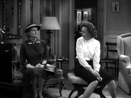 Joan ( left ) in the role of Miss Fern