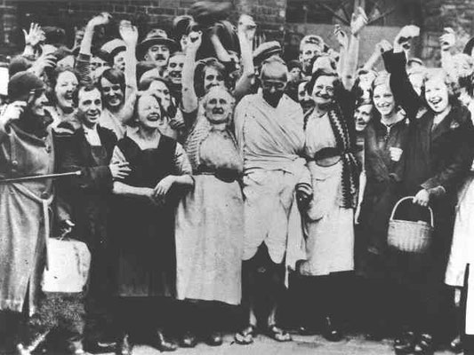 Gandhi with cotton mill workers  in Central England