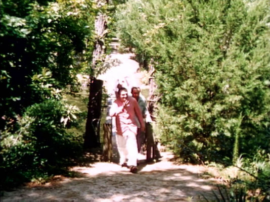 1956 ; Meher Center, Myrtle Beach, SC. ; Meher Baba walking across the Center's bridge. The images were captured by Anthony Zois from a film by Sufism Reoriented.