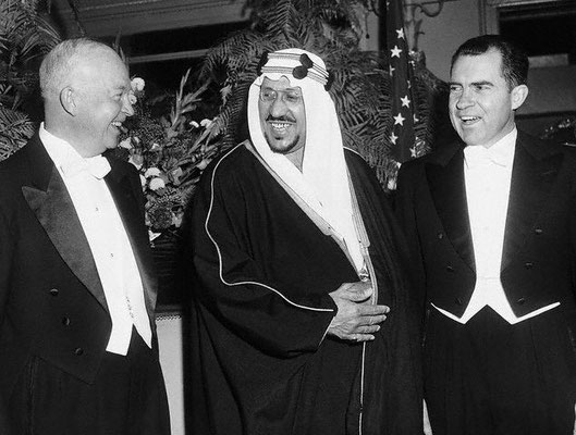 King Saud with President Eisenhower and Vice President Nixon in Washington at a state dinner in his honour.