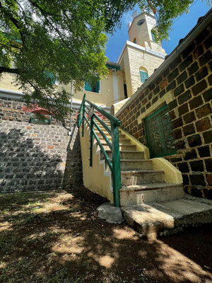 Newly repaired staircase and Westside of the Meher Retreat Building, August 2022- Photograph courtesy Kitty Muir