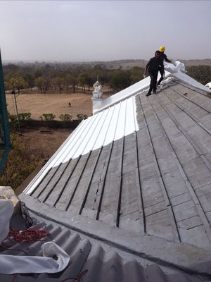 Waterproof membrane being added to the original roof