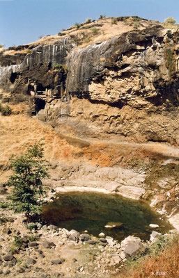 Jain Caves : Looking at cliff path leading from Cave 31 to Cave 32 ; photo by Anthony Zois