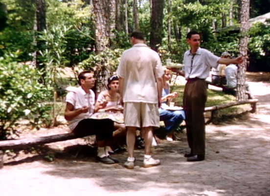 1956 ; Meher Center, Myrtle Beach, SC. ; Group of people having lunch. The images were captured by Anthony Zois from a film by Sufism Reoriented.