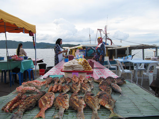 Philippinische Fischverkäufer.