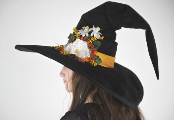 Velvet witch hat with sculpted buckram cone and hand-made flowers.