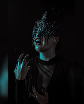 Bespoke gothic mask with feathers, baroque details and beadwork.