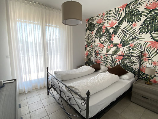 Schlafzimmer OG - Ferienhaus Albarella - geschmackvoll