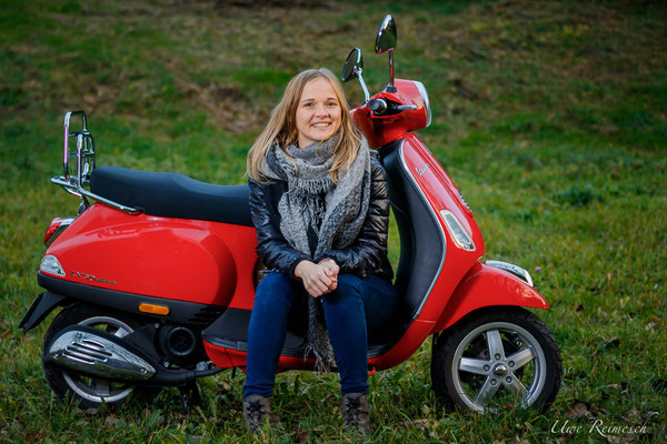 blonde girl, red scooter