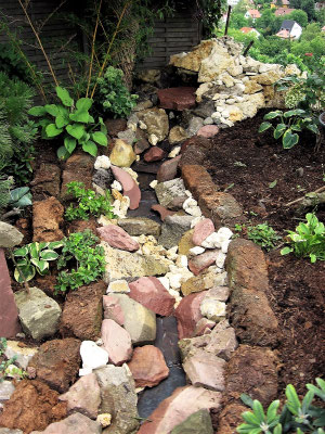 Natursteinarbeiten Pflasterarbeiten Trockenmauer Würzburg
