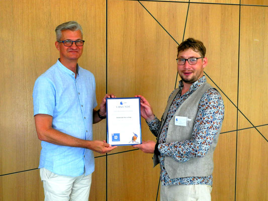 Schulleitung Chr. Schmitz mit Dr. Stimmler