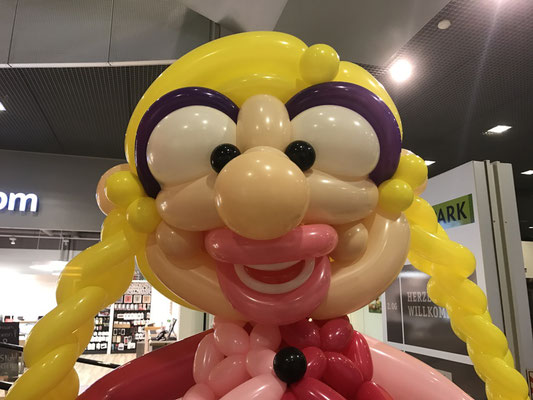 Ballonkopf Frau