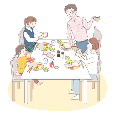 朝ごはんを食べる家族