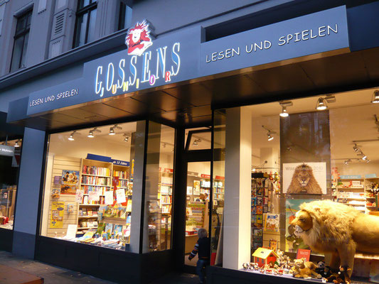 Gossens, Düsseldorf | Transparent dekupiert/durchgesteckt + Folienkaschierung frontseitig auf den durchgesteckten Buchstaben