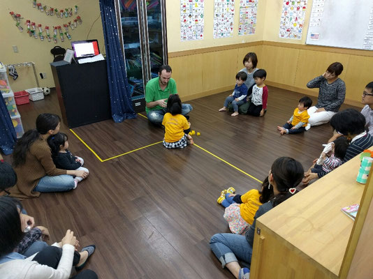 Saturday baby class, some of the babies older siblings are there to help