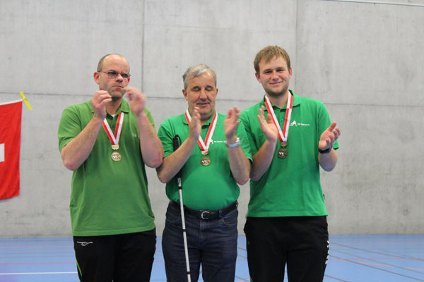 Team Schilt auf dem Podest