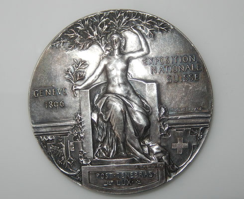  médaille de l'exposition nationale Suisse Genève 1896 .bronze argenté  62 mm . par A  Meyer et  Huges Bovy . prix 80 euros 