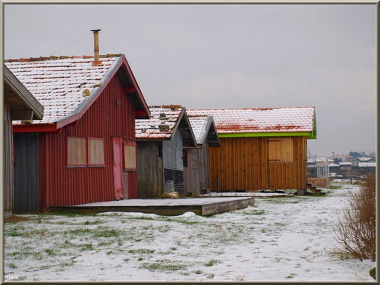 Cabanes en habit neigeux