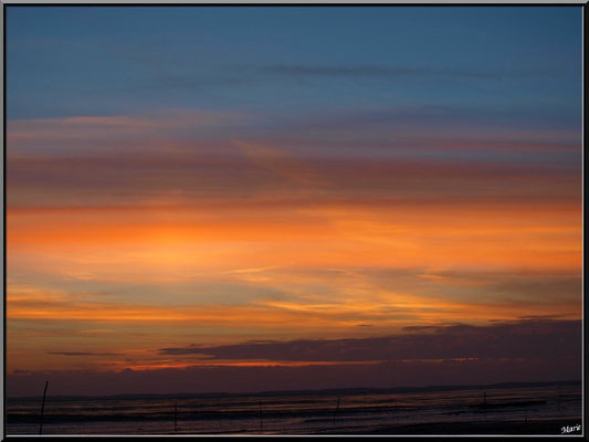 Coucher de soleil sur le Bassin, en juillet, vu du port