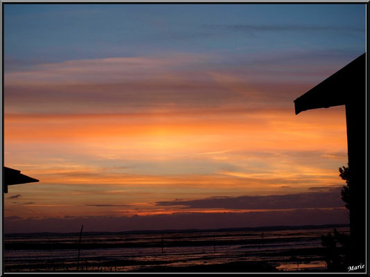Coucher de soleil entre les cabanes, en juillet