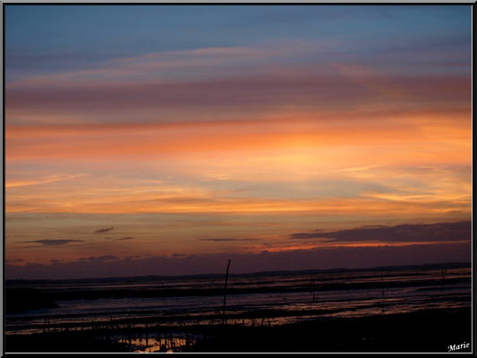 Coucher de soleil sur le Bassin, en juillet, vu du port