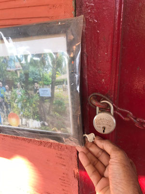 Key to cabin is behind picture frame
