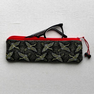 Trousse allongée en galon de tatami grues or
