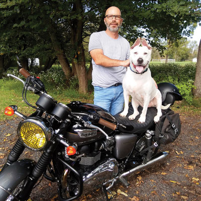 For "New Additions", my boy Cyrus and I with my 2012 Bonneville in 2018