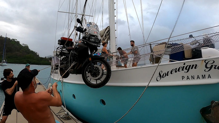 hoisting the bike on board to sail to south America