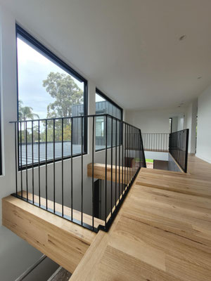 electrostatic spray painting of staircase and balustrades for a residence in Sutherland Sydney by Alpha Coatings