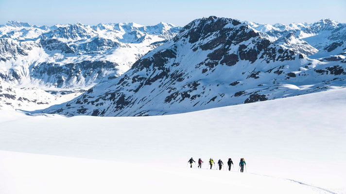 crossing the glacier plateau below Piz Buin