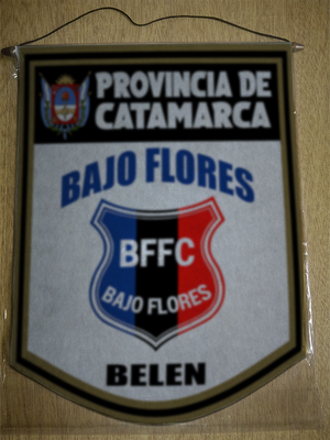 BANDERIN 40 CM DORADO BAJO FLORES FC BELEN