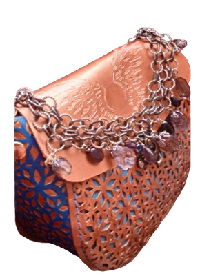 sac en cuir marron western de côté
