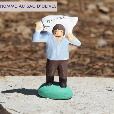 homme au sac d'olives