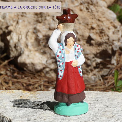 femme à la cruche sur la tête