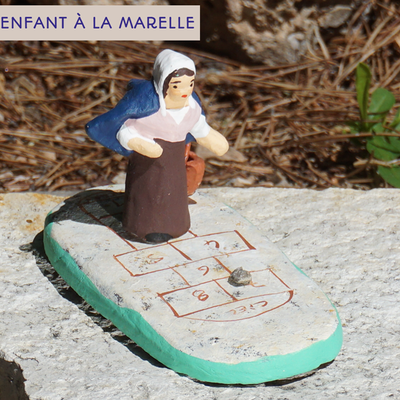 enfant à la marelle