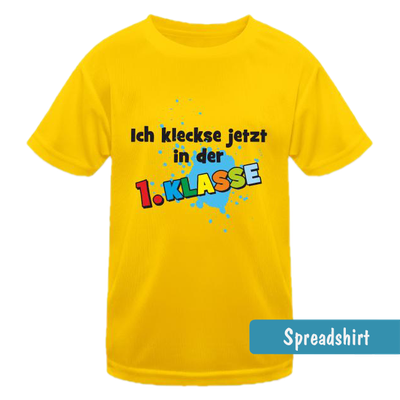 Einschulungs-T-Shirt mit blauen Farbspritzern und dem Text Ich kleckse jetzt in der 1. Klasse in bunten Buchstaben