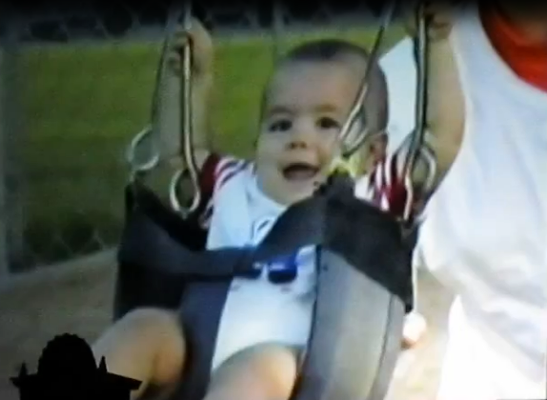 Baby Joe on a swing.