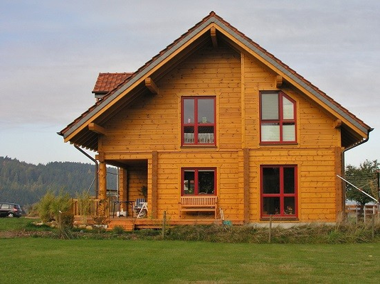 Holzhaus in echter Blockbauweise - Architektenhaus - Wohnblockhaus - Blockhausbau - Einfamilienhaus - Holzbau - Hausbau - Blockhaus kaufen und bauen mit Planung