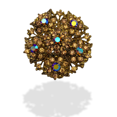 Shimmering tiered flower design Brooch, studded with amber rhinestone and emphasized by fiery Carnival stones -art.282/5