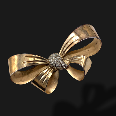 Gorgeous Italian bow/ribbon brooch signed - 800 sterling in gold plated illuminated by a pave of zircon - Art.193/5