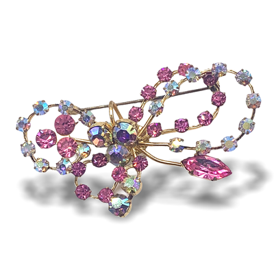 1950 Sweet loveliness Aurora Borealis rhinestones abstract design of a bow/ribbon lit by myriads of pink sparks & gold -- art.528/4 -