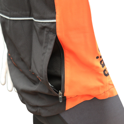 Custom printed convertible cycling jacket gilet with large zipped side pocket for removable sleeve storage.