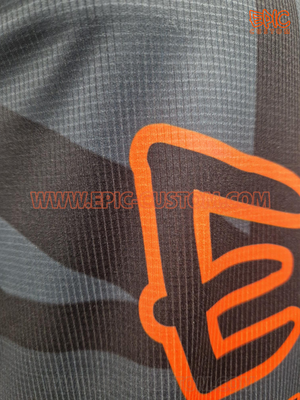 Close-up view of Super DryLite yarn used in custom printed running vests, showing the lightweight performance fabric structure and moisture-wicking properties.