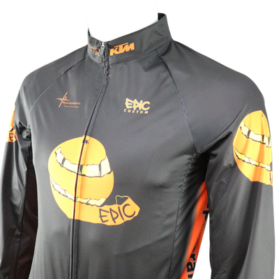 Custom branded All Seasons Pro cycle shower wind jacket rear upper panel detail with premium sublimation printing.