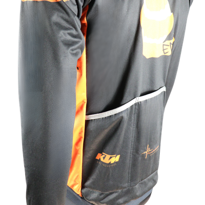 Custom branded Sub-Zero winter cycling jacket large rear pocket detail for practical winter riding storage.