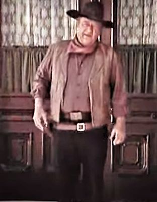John Wayne used black pants and violet shirts from Western Costume in several appearences for commercials in the 70s, seen here in his endorsement of US Savings Bonds.