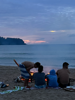 Evening stroll at the Beach with some locals hanging around a fire